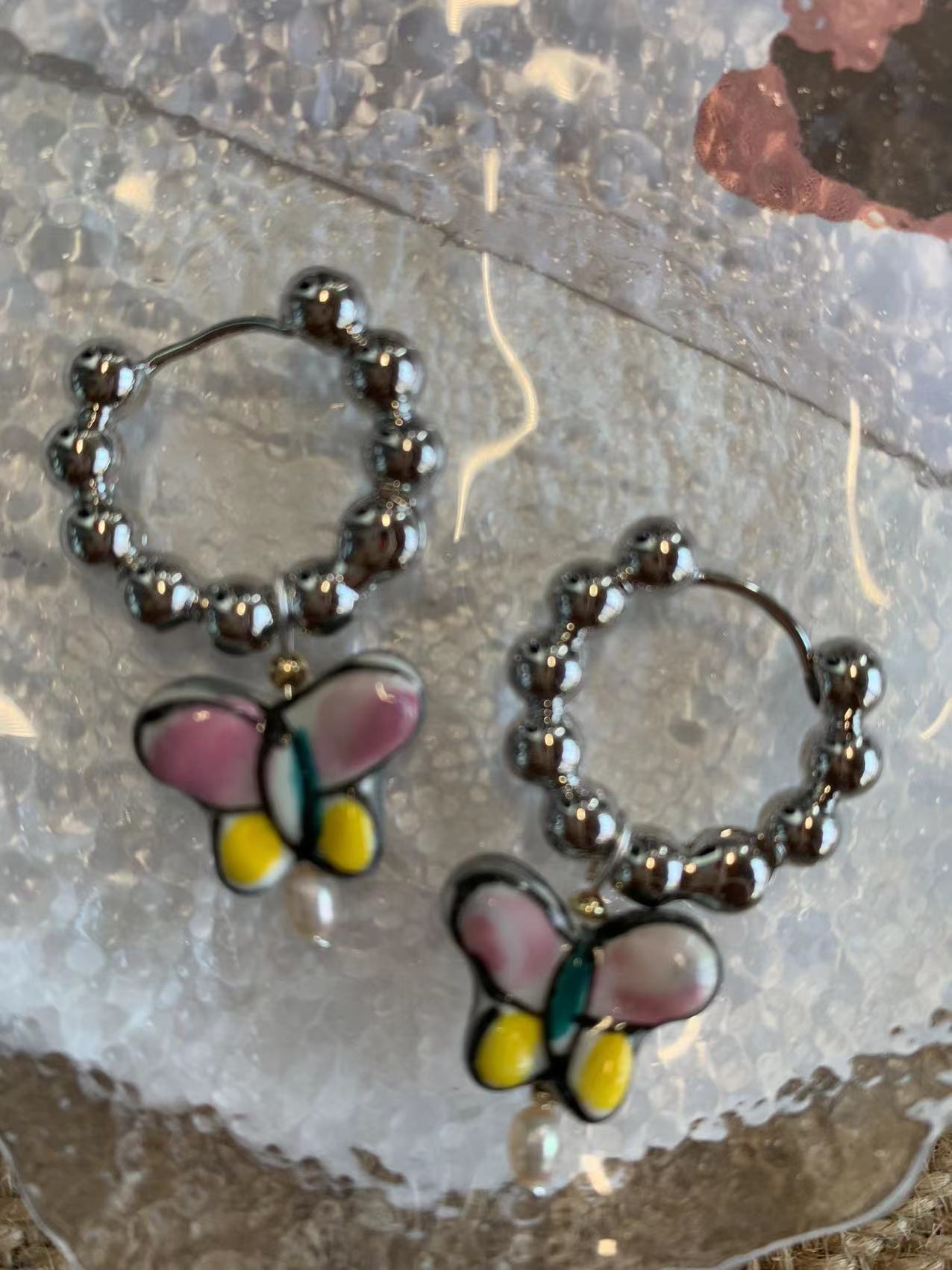 Simple purple butterfly pearl earrings